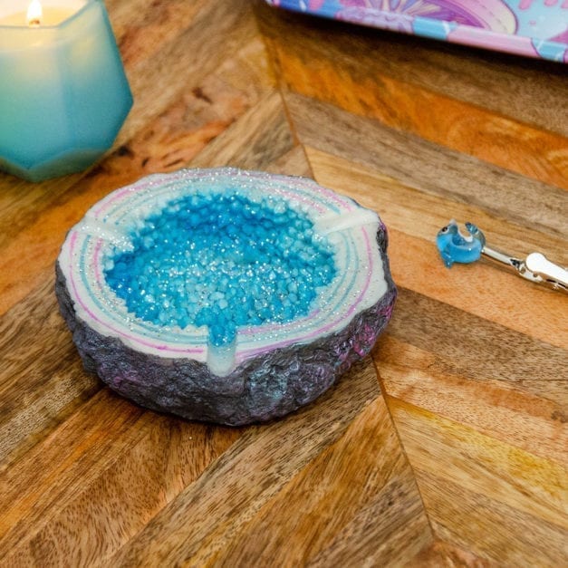 Wide photo of Blue Sparkling Geode Ashtray alongside matching accessories.
