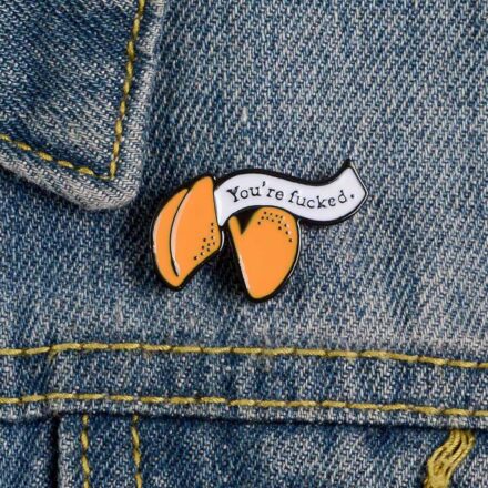 You're Fucked Fortune Cookie Funny Enamel Pin - On Denim Jacket