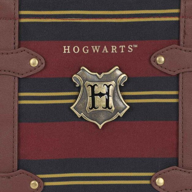 Close-up of metal Hogwarts emblem on Hogwarts Lunch Tote