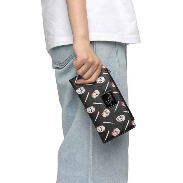 Model holding the Friday the 13th Bi-Fold Wallet