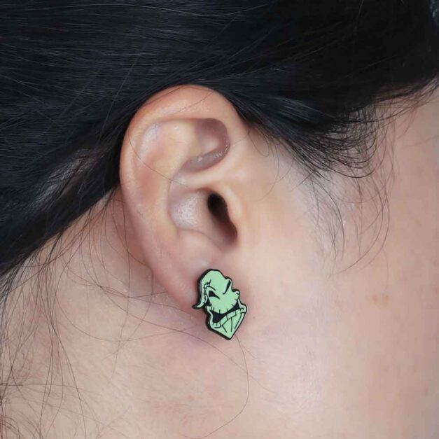 Model Wearing Oogie Boogie Face Earring from The Nightmare Before Christmas Set
